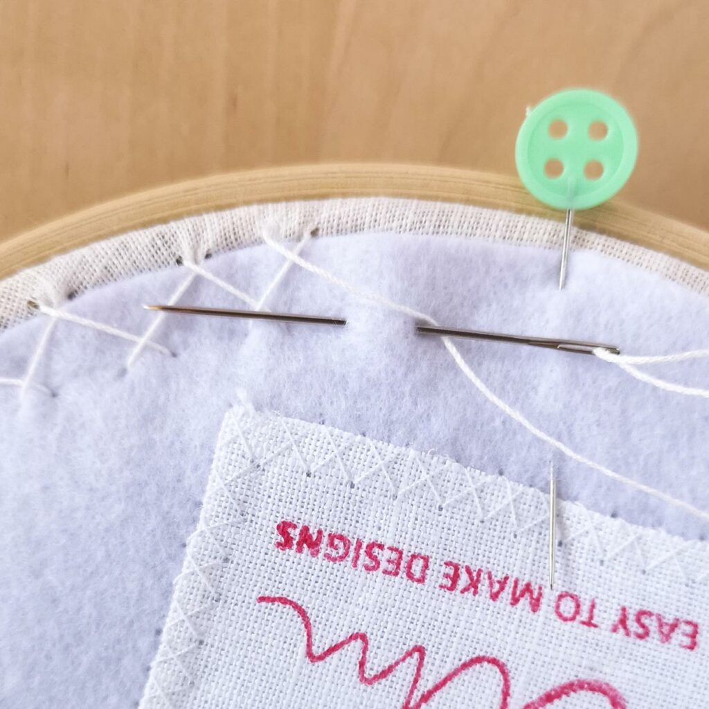 Framing the embroidery in a hoop 7 Backing the hoop with felt and herringbone stitch