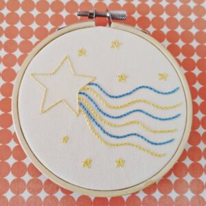 Sun, Moon, and the Stars - Colorful hand embroidery patterns for beginners 9 hand embroidered star with a wavy tail